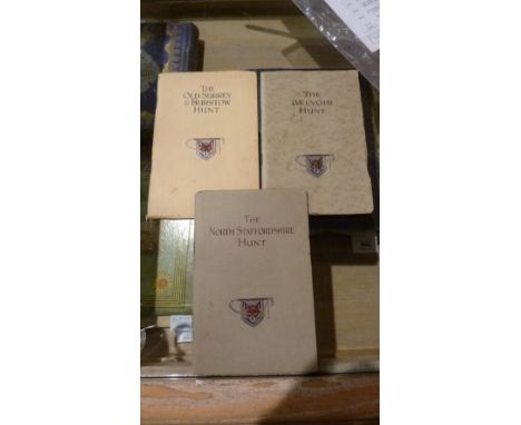 A collection of hunting related books and ephemera to include three illustrated pamphlets for the Old Surrey & Burstow, Belvo