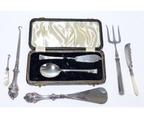 A small group of variously hallmarked silver items to include a cased pair of George VI hallmarked silver butter knife and pr