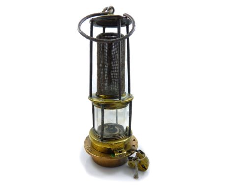 A circa 1890 Clanny style miner's flame safety lamp, possibly by Baxendale of Manchester, unbonneted, height 23.5.