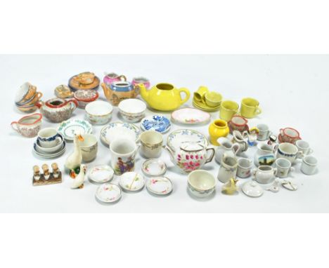 A quantity of children's ceramic toy tea ware in various sets and individual items including cups, saucers, jug and bowl, tea