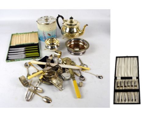 A quantity of electroplated items including a teapot, bottle coaster and a cased set of six pastry forks.