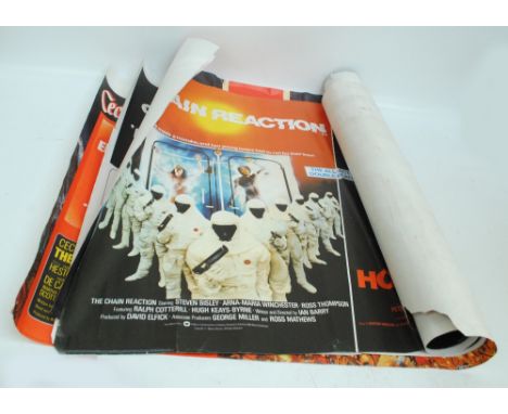 A group of vintage movie posters comprising 'The Ten Commandments', 'Every Which Way but Loose', 'The Sea Wolf' and a double 