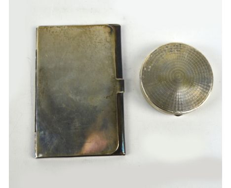 HENRY CLIFFORD DAVIS; a George V hallmarked silver circular powder compact with engine turned decorated hinged lid, Birmingha