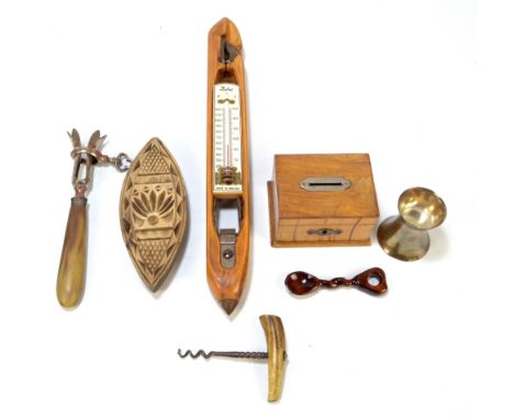 A small group of collectors' items to include a weaving shuttle converted to a thermometer, an antler handled corkscrew, a mo
