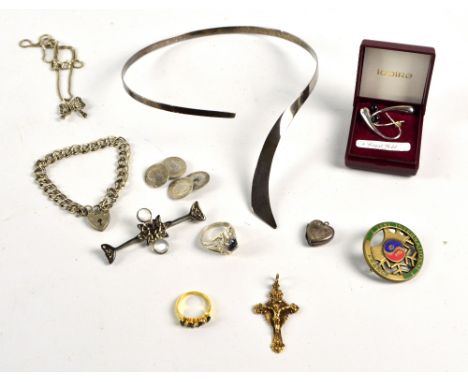 A small group of predominantly silver costume jewellery to include a charm bracelet, a ring and a ribbon marcasite set pendan