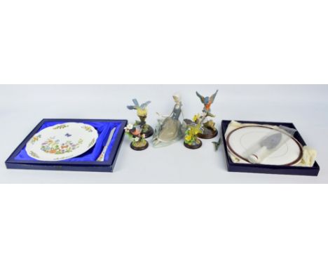 A small group of ceramics including a Lladro figure of a seated girl with dove, a Royal Doulton 'Flying Bullet' and a Border 