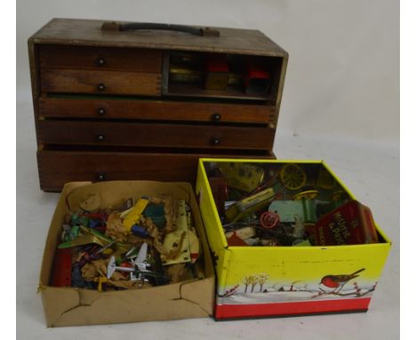 A quantity of vintage Meccano including a five drawer cabinet and associated loose pieces.