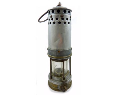 A circa 1920 aluminium and brass Davis of Derby officials gas testing lamp with middle-ring shut-off, height 26cm.