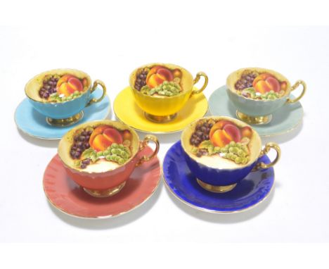 A set of five variously coloured glazed Aynsley tea cups and saucers transfer decorated with grapes, peaches and berries to t