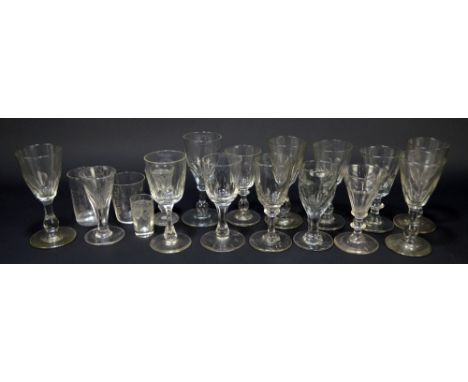 A group of predominantly 19th century wine and dram/port glasses to include examples with knopped and baluster stems, lens cu