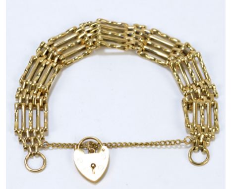 A 9ct yellow gold gate link bracelet, with padlock clasp, approx 21.6g.