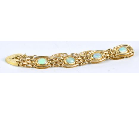 A 9ct yellow gold and opal gate bracelet, with heart padlock clasp, total approx 19.0g. CONDITION REPORT: Minor surface wear,