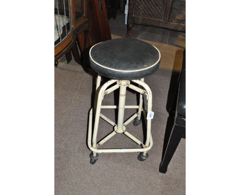 A vintage spring tubular framed cream painted stool with adjustable black leather seat, height as pictured approx 64cm.