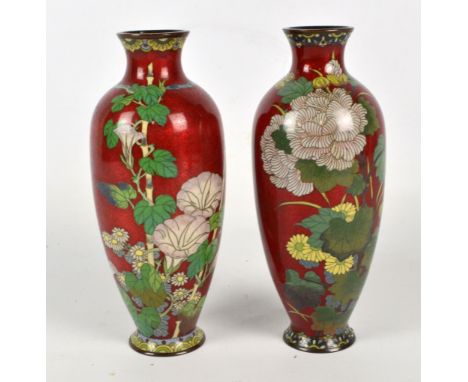 A pair of 20th century Japanese gimbari and cloisonné baluster vases decorated with blossoms on a red ground, height 22cm. CO