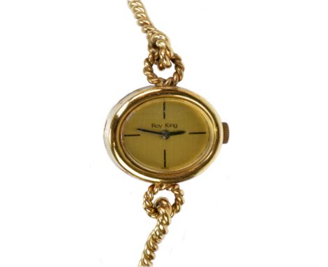ROY KING; a lady's vintage 9ct yellow gold wristwatch with oval dial and rope twist bracelet, with original guarantee dated 1