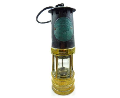 A circa 1900 Ackroyd & Best Type 01 miner's safety lamp, height 26.5cm.