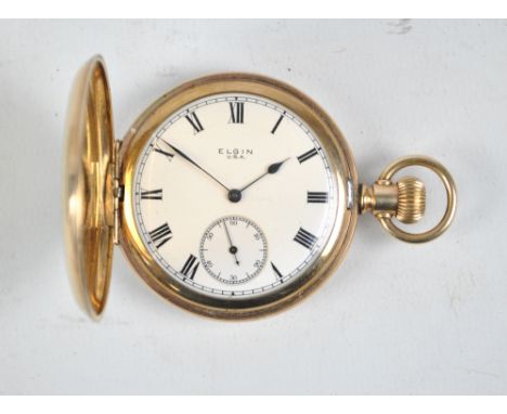 ELGIN; a gold plated hunter cased pocket watch, the white enamel dial with subsidiary seconds.
