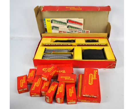 A boxed Tri-ang OO/HO gauge model trains set comprising engine, tender, two carriages plus length of track with leaflet, also
