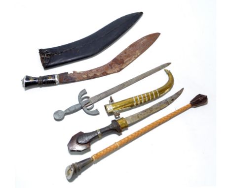 A large Gurkha kukri knife, length 56cm including leather scabbard and horn handle (two small knives missing), a brass and ho