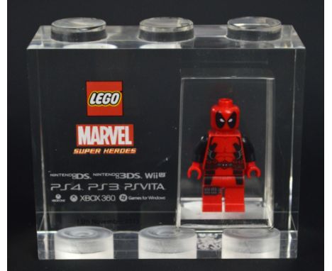 A Lego for TT Games Minifigure acrylic trophy brick, Deadpool from the Marvel Super Hero game, issued 15th November 2013, 8 x