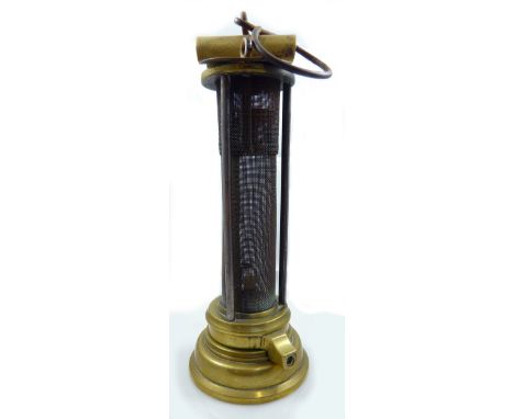 A circa 1880 Davy style miner's safety lamp, unmarked, possibly by Joseph Cooke of Birmingham, height 24cm. CONDITION REPORT: