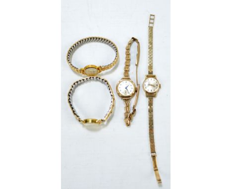 GARRARD; a lady's 9ct yellow gold wristwatch, with circular dial and brick link bracelet, and three further lady's gold cased