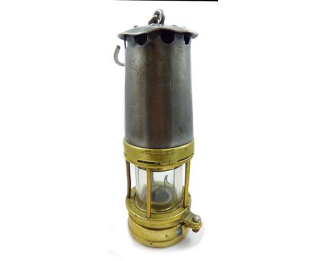 A circa 1900 Clanny style Edwards of Wakefield miner's safety lamp with lead rivet lock, height 23cm.