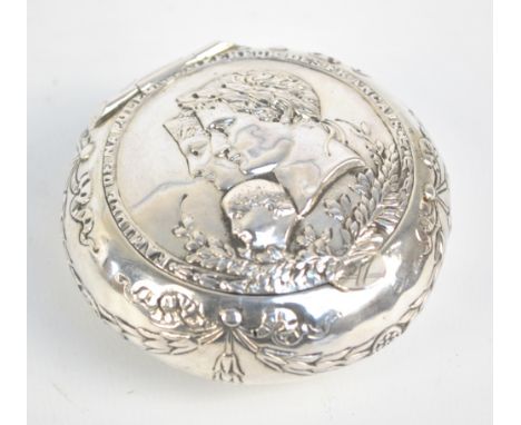 A 19th century Dutch silver circular snuff box embossed with bust of Emperor Napoleon and his family to the hinged lid and wi