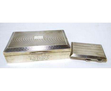 A George V hallmarked silver cigarette case of rectangular form with engraved initials, Birmingham 1927, approx 3ozt, and a s