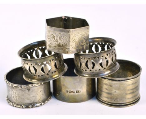 A George VI hallmarked silver napkin ring, Sheffield 1944, three further hallmarked silver napkin rings, combined approx 3ozt