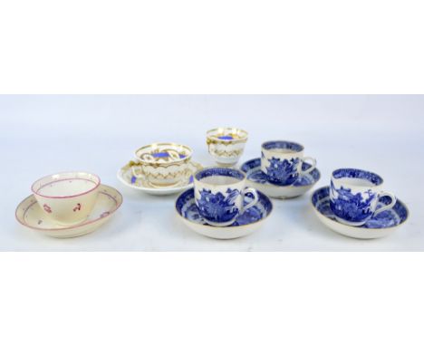An 18th century tea bowl and saucer with pink floral and foliate painted decoration, a 19th century Rockingham 1501 pattern g