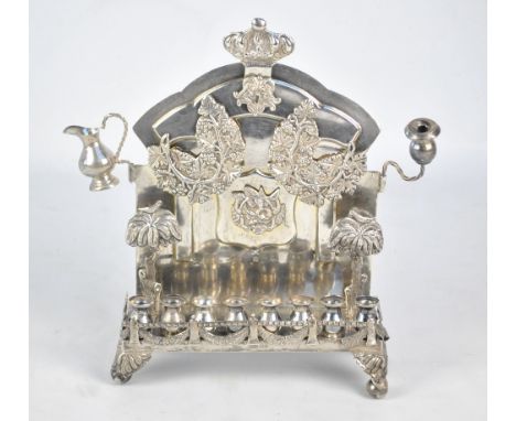 ISRAEL SZEKMAN; a late 19th century Polish silver Hanukkah lamp with eight baluster shaped oil sconces on rectangular garland