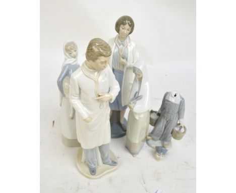 Three Nao figures; a male and female doctor and a girl carrying a rabbit, also two Lladro figures; a girl carrying a sheep (s