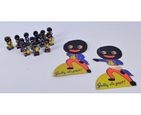 A collection of thirteen early 20th century ceramic Gollies with painted detail, height of each approx 7.5cm, some with appli