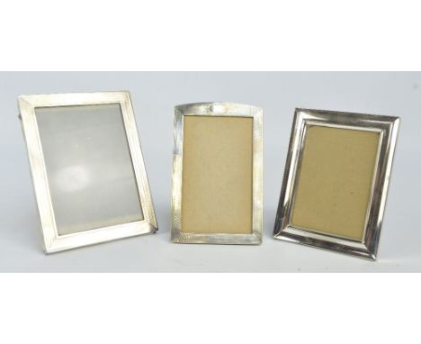 BOOTS PURE DRUG CO; a George V hallmarked silver fronted rectangular photograph frame with engine turned decoration, Birmingh