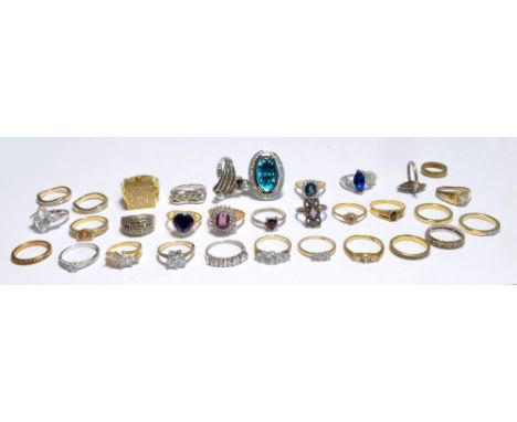 A quantity of costume dress rings including a silver ring set with heart shaped sherry coloured stone, two silver and marcasi