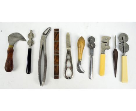 A WWI military issue steel bladed pruning knife by Walter Graly & Son of Sheffield, dated 1917, length 14cm, and a further la