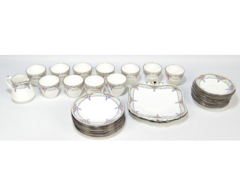 SHELLEY; an Art Deco style transfer decorated tea set comprising eleven cups, twelve saucers, eleven side plates, a cream jug