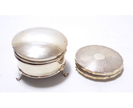 A & J ZIMMERMAN LTD; a George V hallmarked silver small circular ring box with hinged lid raised on tripod feet and a George 