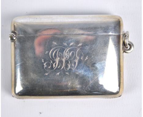 T & J BRAGG LTD; a Victorian hallmarked silver two-section vesta case of plain curved form initialled JBD to one side with su