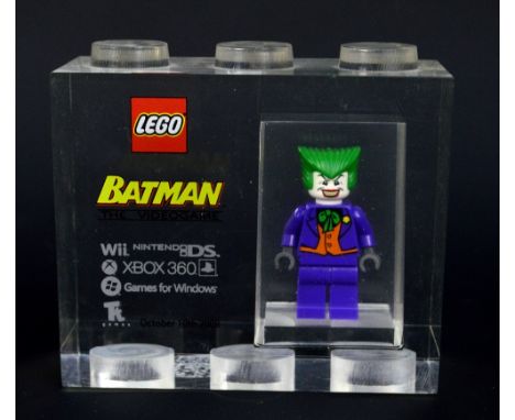 A Lego for TT Games Minifigure acrylic trophy brick, The Joker from Batman: The Video Game, issued 10th October 2008, 8 x 9.1