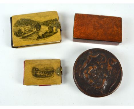 A circular tortoiseshell lined snuff/patch box, possibly fruitwood, with relief decoration to the lid, diameter 8cm, two Mauc