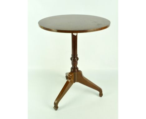 A reproduction yew wood circular tripod occasional table, height 58cm, on spade feet.