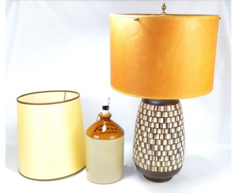 A 1960s style ceramic lamp base and a further example converted from a stoneware flagon inscribed 'John Smith's Tadcaster Bre