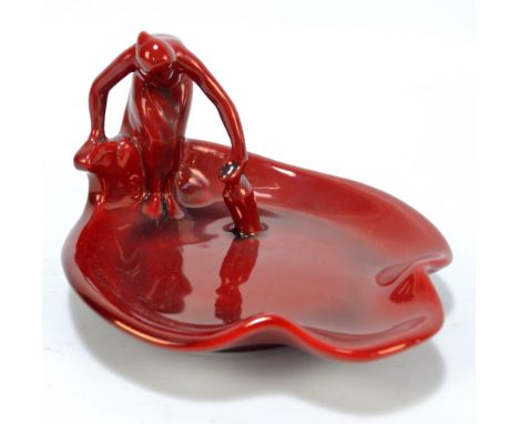 A Zsolnay Pecs figural flambé glazed soap dish, 'The Water Carrier', with factory mark to base, length approx 13.5cm, height 