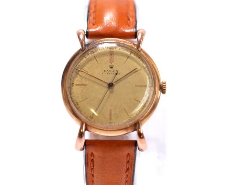 ROLEX; a gentleman's vintage gold plated and stainless steel backed wristwatch, the circular dial inscribed 'Rolex Precision'