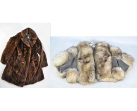A three-quarter length brown mink fur coat with internal stitched label for Kendal Milne, Manchester, and a short silver and 