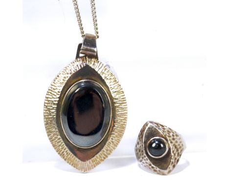 SYDNEY BEDDAE; an Elizabeth II hallmarked silver pendant, with fine link chain, Sheffield 1972, and a matching ring, Birmingh