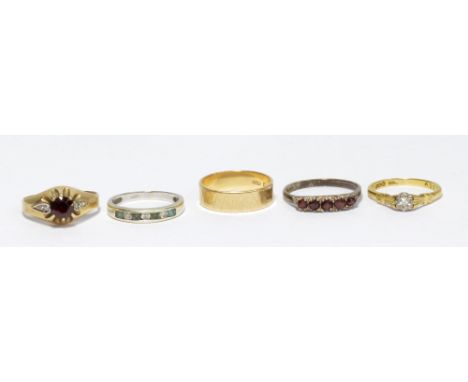 A collection of rings comprising an 18ct gold and diamond ring with illusion set stone, size J 1/2, a 9ct yellow gold wedding