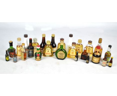 A small collection of various miniatures to include Bells Old Scotch whisky, St Michael Napoleon brandy and Malibu.